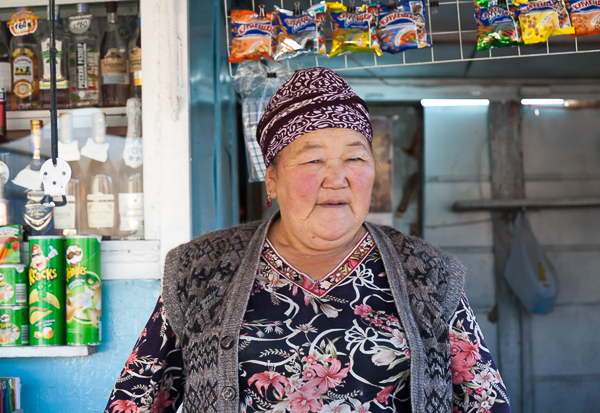 Lady tending her roadside shop (Kyrgyzstan)