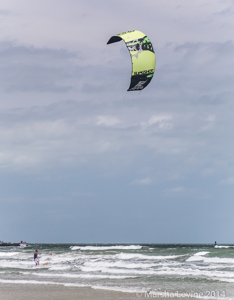 Young man kitesurfing at Jetty Park, Cape Canaveral