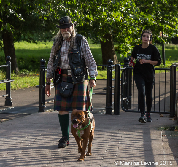 Gentleman walking his dog along the River Cam